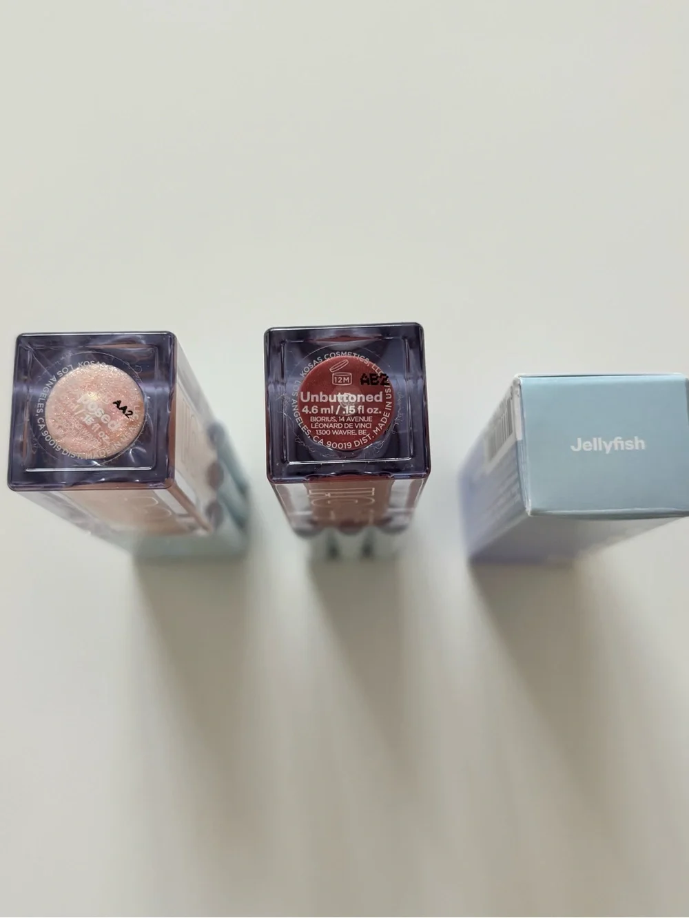 Kosas Wet Lip Oil Plumping Gloss in Unbuttoned, Exposed, and Jellyfish